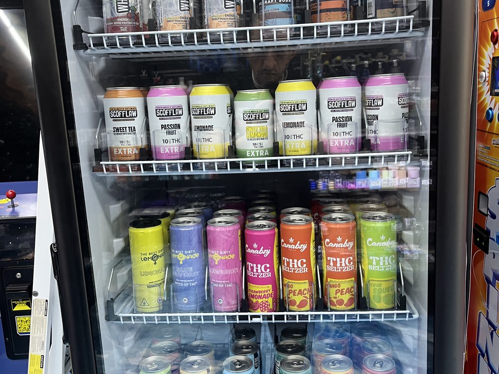 Product aisles inside Elevated 369 smoke and vape shop in Flowery Branch, GA
